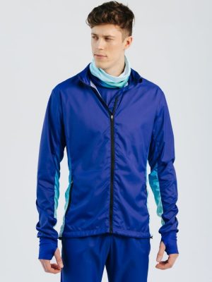 A studio shot of a professional custom teamwear men’s training jacket, featuring a vibrant sublimation printed design with high-performance technical fabric, thumbhole cuffs, and a full-length zipper for elite athletic functionality.